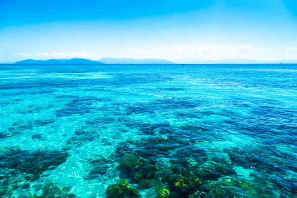 The clear blue water around Green Island